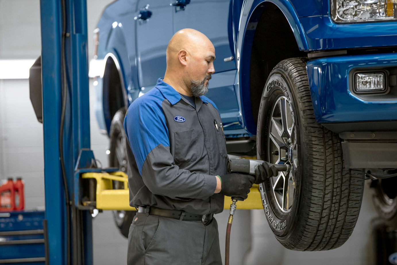 Ford Service Technician working on Used Ford Truck